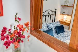 Postel nebo postele na pokoji v ubytování Casa Paco