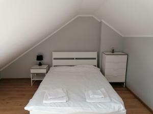 Łóżko lub łóżka w pokoju w obiekcie Apartament Górska Fantazja