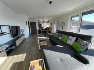 Posezení v ubytování Penthouse Lebierre