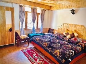 Postelja oz. postelje v sobi nastanitve La Voglia-Old Manali