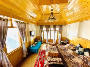 Postelja oz. postelje v sobi nastanitve La Voglia-Old Manali