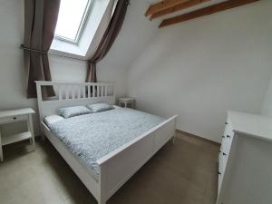 Postel nebo postele na pokoji v ubytování Ubytování v soukromí Pasohlávky