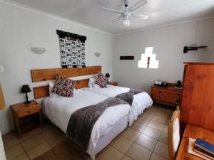 Postel nebo postele na pokoji v ubytování Aanhuizen Guest House