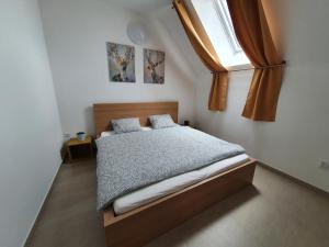 Postel nebo postele na pokoji v ubytování Ubytování v soukromí Pasohlávky