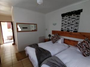 Postel nebo postele na pokoji v ubytování Aanhuizen Guest House