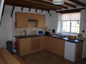 Η κουζίνα ή μικρή κουζίνα στο Red Lion