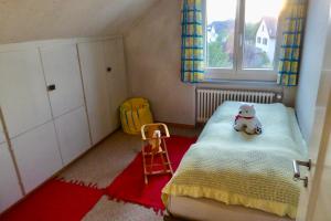 Postel nebo postele na pokoji v ubytování Guntli’s family Guesthouse