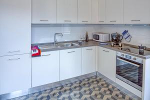 Cucina o angolo cottura di Leone I and Leone II Apartments