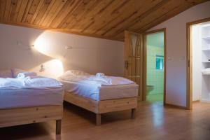 Posteľ alebo postele v izbe v ubytovaní Rytebłota Resort & Spa