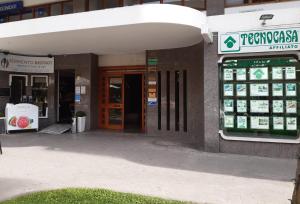 a gas station with a sign in front of it at Aquae Romanae Piazza Lauro in Sorrento