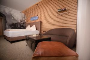 Uma cama ou camas num quarto em Gasthof Berghof