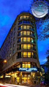 a point hotel building with a sign on it at Point Hotel Taksim in Istanbul