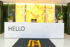 a melico stand in front of a building at N Hotel BY NOSHI in Rinas