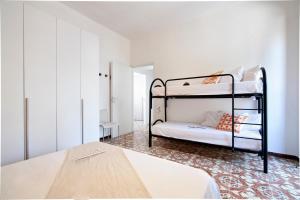 A bed or beds in a room at Baia Verde Beach & Fun Gallipoli - Lecce Selection