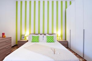 A bed or beds in a room at Baia Verde Beach & Fun Gallipoli - Lecce Selection