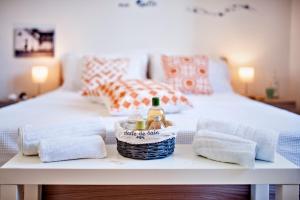 A bed or beds in a room at Baia Verde Beach & Fun Gallipoli - Lecce Selection