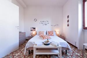 A bed or beds in a room at Baia Verde Beach & Fun Gallipoli - Lecce Selection