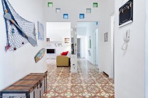 A television and/or entertainment centre at Baia Verde Beach & Fun Gallipoli - Lecce Selection
