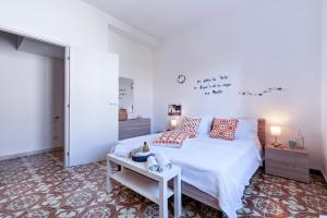 A bed or beds in a room at Baia Verde Beach & Fun Gallipoli - Lecce Selection