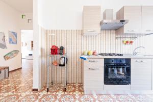 A kitchen or kitchenette at Baia Verde Beach & Fun Gallipoli - Lecce Selection