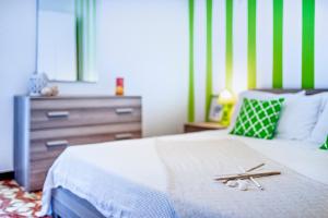 A bed or beds in a room at Baia Verde Beach & Fun Gallipoli - Lecce Selection