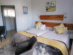 Katil atau katil-katil dalam bilik di Aanhuizen Guest House +42 gambar