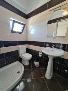 Koupelna v ubytování Hotel Ardiani