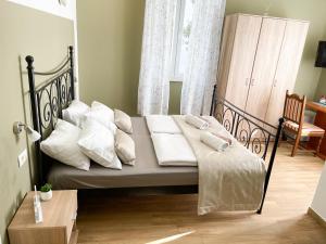 Postel nebo postele na pokoji v ubytování Rooms Lucia