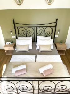 Postel nebo postele na pokoji v ubytování Rooms Lucia
