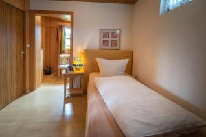 Ein Bett oder Betten in einem Zimmer der Unterkunft Pension Villa Lockstein