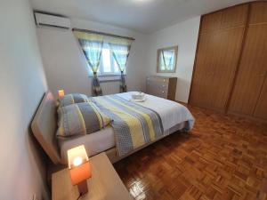 Postel nebo postele na pokoji v ubytování Villa IN