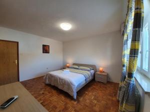 Postel nebo postele na pokoji v ubytování Villa IN