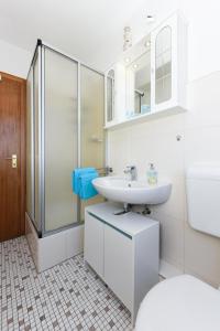 Ein Badezimmer in der Unterkunft Ferienwohnungen Wind & Meer