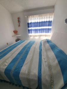 Una cama o camas en una habitación de La mejor ubicación. A unas cuadras del centro