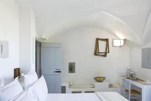 Postel nebo postele na pokoji v ubytování Masseria Cimino