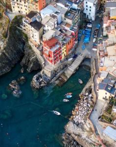 an aerial view of a harbor with boats in the water at Pepita di Rio in Riomaggiore