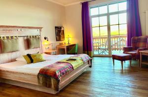 Voodi või voodid majutusasutuse Hotel Sonnenhof Aspach toas
