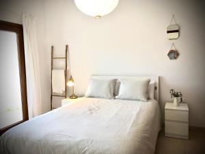 Posteľ alebo postele v izbe v ubytovaní Casa La Juyona