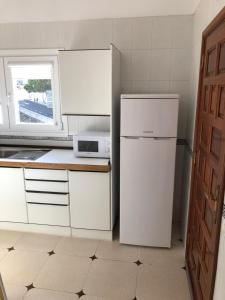 Kuchyňa alebo kuchynka v ubytovaní Casa La Juyona