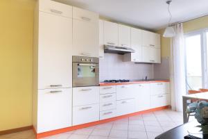 Kuchyň nebo kuchyňský kout v ubytování Appartamento Borgo Peschiere