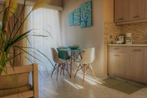 Kuchyň nebo kuchyňský kout v ubytování Remvi Deluxe Apartment 104 with Sea View