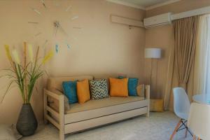 Posezení v ubytování Remvi Deluxe Apartment 104 with Sea View