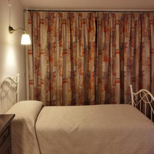 Posteľ alebo postele v izbe v ubytovaní Casa Panorama