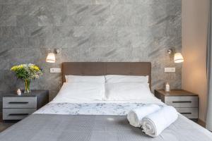 A bed or beds in a room at City Break Nomentana