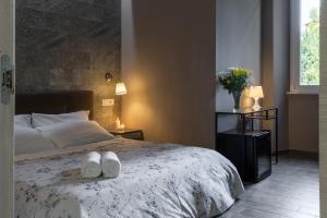 A bed or beds in a room at City Break Nomentana