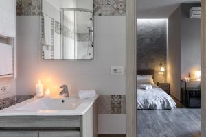 A bed or beds in a room at City Break Nomentana