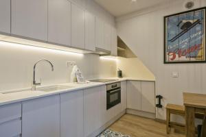 Η κουζίνα ή μικρή κουζίνα στο Luderna - Apartamento Meligar