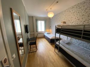 Palanda nebo palandy na pokoji v ubytování Uppsala Hostel by CityStay