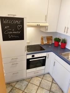 Kuchyň nebo kuchyňský kout v ubytování Hotel.Pension.Golingen