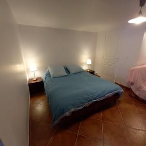 Ein Bett oder Betten in einem Zimmer der Unterkunft La petite campagne